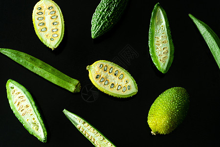 黑色背景平地上绿色蔬菜葫芦情调女士药品团体美食植物水果农场营养图片