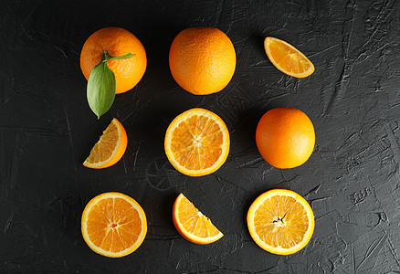 黑色背景 最上视图的平面结构 含熟橙子和黑底橘子图片