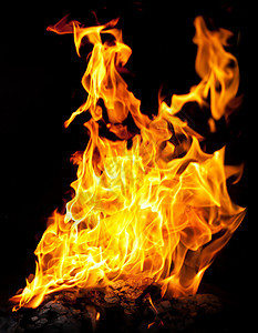 火焰燃烧橙子篝火余烬黄色煤炭木炭烧伤辉光图片