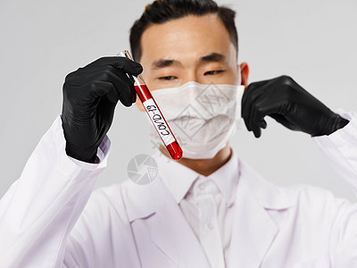 男性实验室助理医疗面罩黑手套血液测试研究 男化验室助理图片