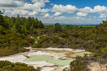 新西兰Waiotapu热热区绿松石湖喷泉旅游蒸汽地标森林矿物陨石衬套火山天空图片