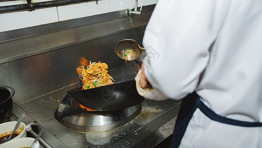 厨师做炒饭厨房油炸蔬菜食物运动垃圾炒锅火炉餐厅餐饮图片