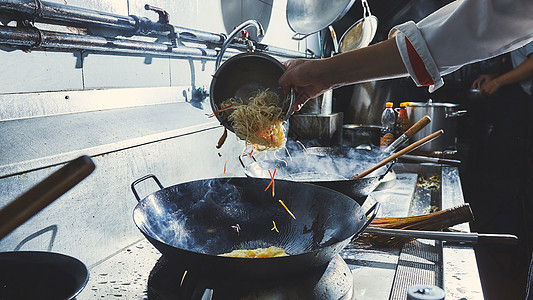 厨师做炒饭火焰职业炒锅运动厨房火炉食物烧伤油炸平底锅图片