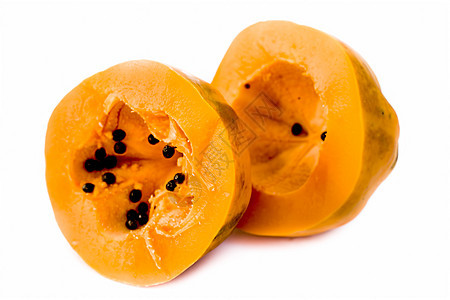 原有机切木瓜在白色上被隔离情调裂缝反射营养异国种子饮食维生素水果橙子图片