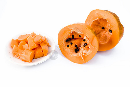 原有机切木瓜在白色上被隔离维生素水果饮食果汁食物种子异国反射橙子甜点图片
