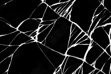 智能手机的破裂的黑玻璃作为设计的背景窗户损害碰撞屏幕玻璃黑色划痕材料破坏展示图片