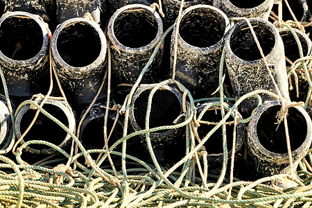 在圣波尔码头捕鱼章鱼和网的陷阱齿轮塑料水产海洋生物漂浮环境海洋港口黏土绳索图片