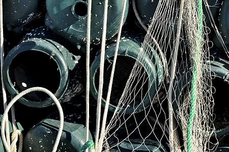 在圣波尔码头捕鱼章鱼和网的陷阱浮标海洋生物海岸钓鱼食物海鲜海洋绳索齿轮港口图片