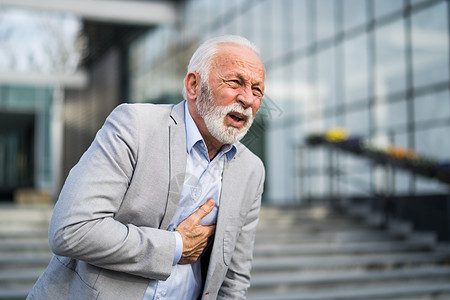 心脏病发作疼痛男性套装人士老板胸部公司管理人员成人阶层图片
