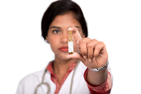 女医生 展示白色背景的医药管子妇女医生外套医院科学家职场手套样本测试工具女士科学背景图片