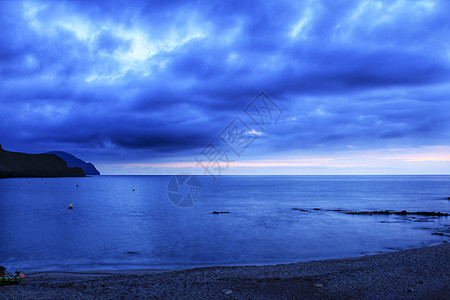 日出在西班牙南部的海滩上橙子卡波季节太阳热带天气阳光村庄小岛场景图片