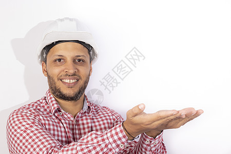 英俊的建筑工人 用白头盔露出手来修理工男人专家职业男性手势劳动领班劳动者安全帽积极的高清图片素材