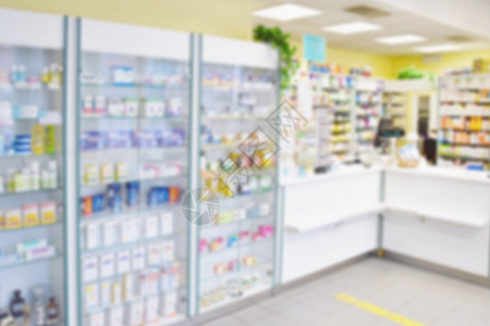 模糊的背景 一家药房的内部 里面有商品和陈列柜 用于健康的药物和维生素 医学和健康概念冠状病毒 COVID 19瓶子产品零售木头图片