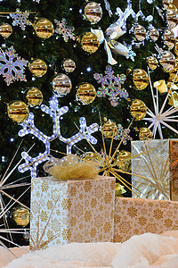 具有圣诞礼物和装饰品的圣诞节抽象色彩丰富多彩的背景背景派对风格庆典礼物传统卡片丝带金子盒子展示图片