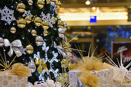 具有圣诞礼物和装饰品的圣诞节抽象色彩丰富多彩的背景背景惊喜盒子卡片装饰风格礼物传统庆典金子假期图片