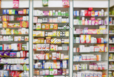 模糊的背景 一家药房的内部 里面有商品和陈列柜 用于健康的药物和维生素 商店概念医学和健康的生活方式治愈零售制药商业治疗店铺化学图片