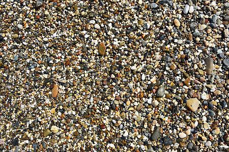 与小石头的抽象五颜六色的背景矿物墙纸材料建筑地面海洋卵石砂砾鹅卵石碎石图片