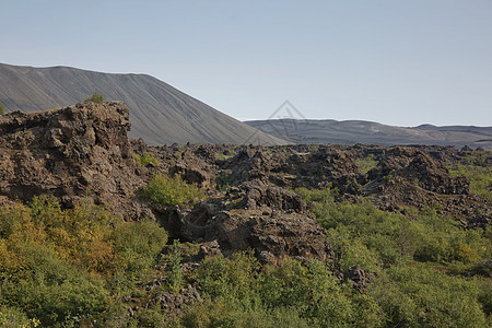 冰岛北部Myvatn湖附近的一个岩石镇 有火山洞 熔岩田和岩层场景遗产岩石国家作用荒野旅游蓝色农村地质学图片