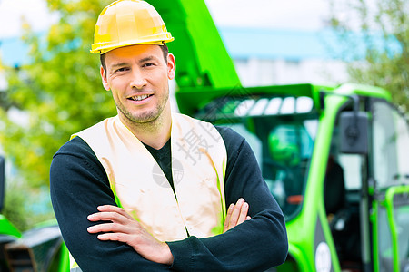 建筑机械前面的建房人挖掘职业毛虫头盔挖掘机安全项目推土机司机安全帽图片