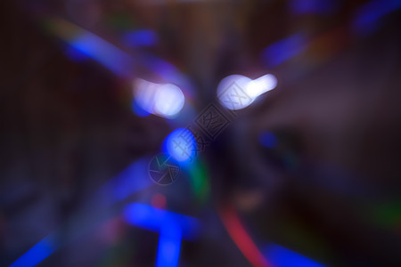 深色背景上的抽象运动散焦灯小径时间蓝色踪迹辉光墙纸纤维力量彩虹黑色图片