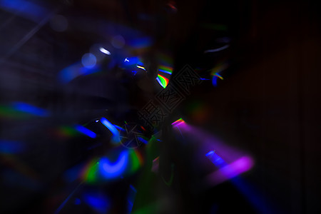 深色背景上的抽象运动散焦灯力量流动辉光纤维彩虹速度小径时间蓝色黑色图片