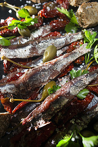 凤尾番茄和披肩面包太阳香菜味道活力美食传统鳀鱼饮食盐渍图片