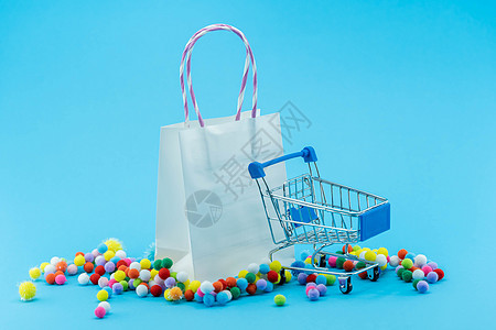 带购物车的购物袋 销售概念 在线商店和购物中心销售的购物概念互联网顾客折扣价格零售营销大车插图商业市场图片