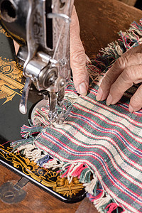 缝纫机的裁缝绳索爱好家庭别针手工机器宏观织物工作细绳图片