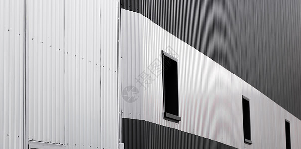 黑白波纹铁皮用作带窗户的仓库或工厂的立面 无缝波纹锌板金属铝立面的纹理 建筑学 金属质感床单线条建造建筑技术材料控制板图片