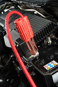 使用跳跃电缆情况红色汽车电池夹子引擎维修黑色机房车辆图片