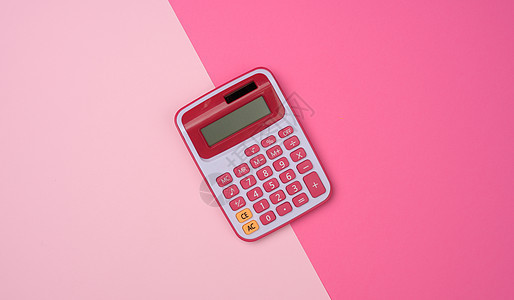 粉红背景粉红色塑料计算器背景图片