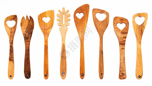 各种木制炊具的心脏形状 木制勺子和木制弹片在白色背景中分离出来手工业木制品收藏木头奶奶假期餐具食物桌子厨师图片
