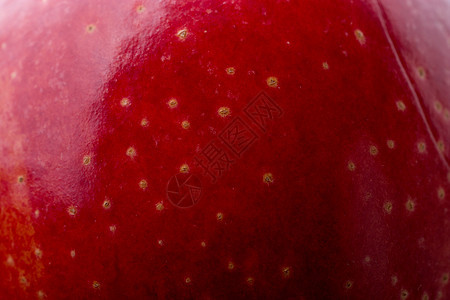 特写视图中带有点的新鲜红苹果生活数字收成饮食减肥食物桌子药品水果损失图片