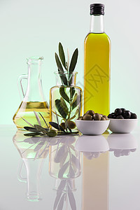 橄榄油瓶 橄榄枝和烹饪油敷料液体玻璃蔬菜健康饮食黄色向日葵白色食物美食图片