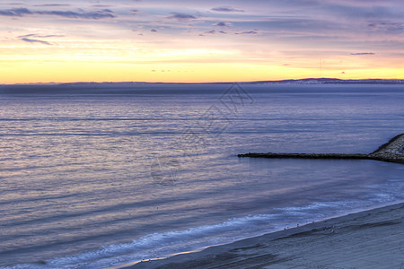 圣波拉的显著和多姿多彩的日落假期海岸线地标天堂橙子支撑自由村庄海滩环境图片