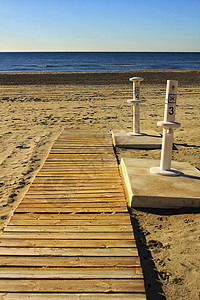 足迹淋浴和通往海滩的步行道民众木头服务海岸盐水足浴假期圣波小路家具图片