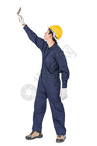 穿着蓝色覆盖板和硬帽的工人 身穿制服 拿着钢铁腰带瓦工手工碎石劳动者手套建设者男人维修头盔石膏图片