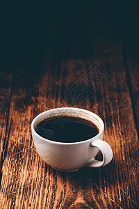 一杯黑咖啡咖啡美食杯子味道酿造服务台面桌子餐厅咖啡杯图片