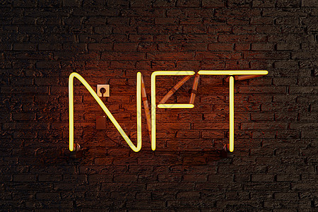 带照明 NFT 标志的黄色霓虹灯图片