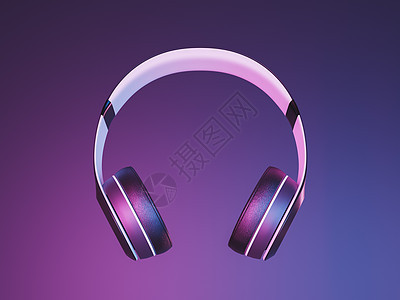 霓虹灯背景上的无线耳机图片