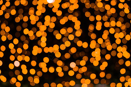 五颜六色的圣诞节抽象散景背景 照明光背景 节日街夜灯金子火花夜生活闪光假期庆典圆圈辉光派对城市图片