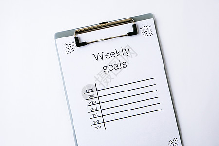 白色背景上的每周目标规划器 计划一周在隔离期间在家工作时保持高效会议桌子议程文档办公室日记时间规划师旅行组织图片