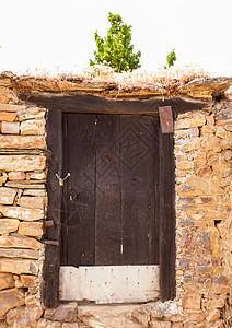 旧西班牙房子的旧门图片