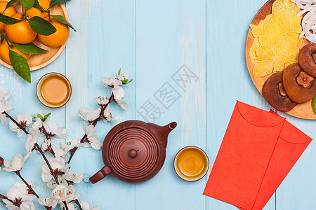 概念平坦的中国新年食物和饮用静水生命 文字出现在图中 繁荣 春天和好运桌子假期金子传统节日运气木头月球水果橙子图片