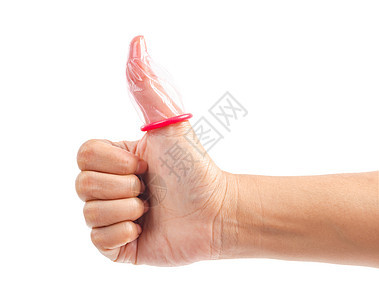 拇指和避孕套被隔离在白色背景上图片