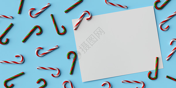 蓝色背景的白皮书模型与圣诞糖果手杖 3d 它制作图案图片