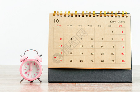 2021年9月绿桌日历 带有粉红色闹钟议程时间表警报假期组织时间日程办公室规划师工作图片