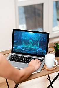 笔记本电脑上忙着打字 比塞德科夫穆格和植物从家完成工作职业女性数据网络全球互联网桌子生长电脑显示器设备图片