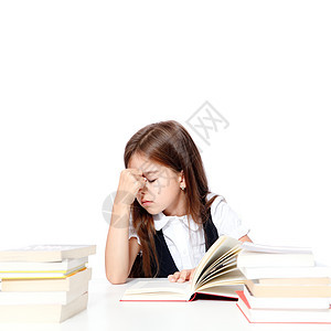 在学校的书桌上睡着很累的小女孩女孩知识童年学习压力瞳孔课堂家庭作业图书馆孩子睡眠图片