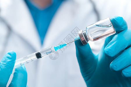 医生持有抗冠状病毒疫苗的毒物药物实验室流感医院治疗安瓿疫苗小瓶手套剂量图片